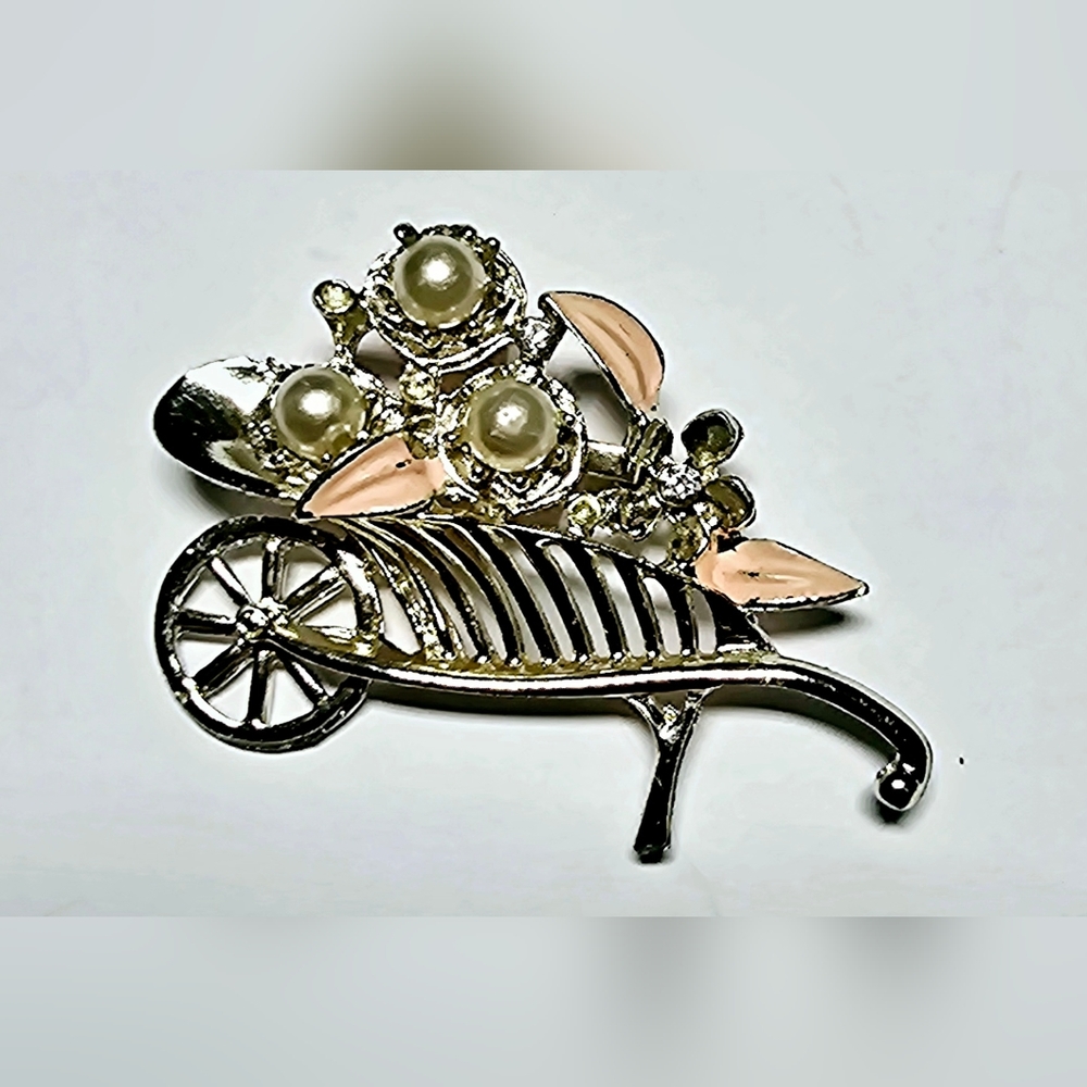 Vintage Silverstone with pink and pearl floral design wheelbarrow brooch